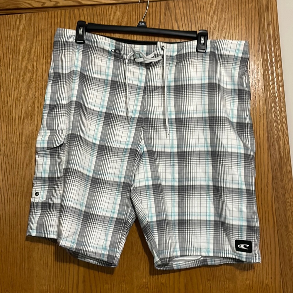 Men's plaid board shorts.
